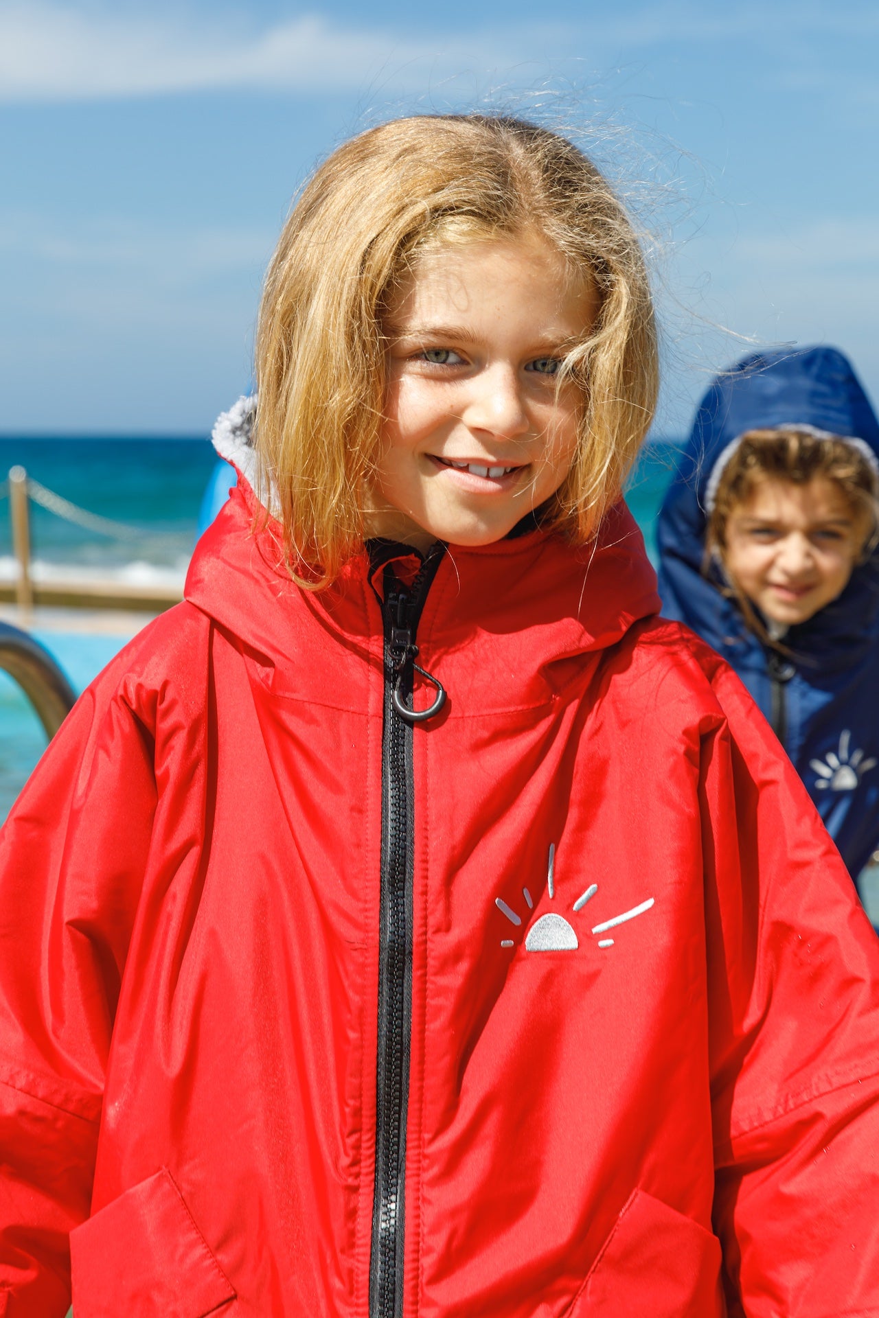 Toasty Ultimate Weatherproof Kids jackets in red 