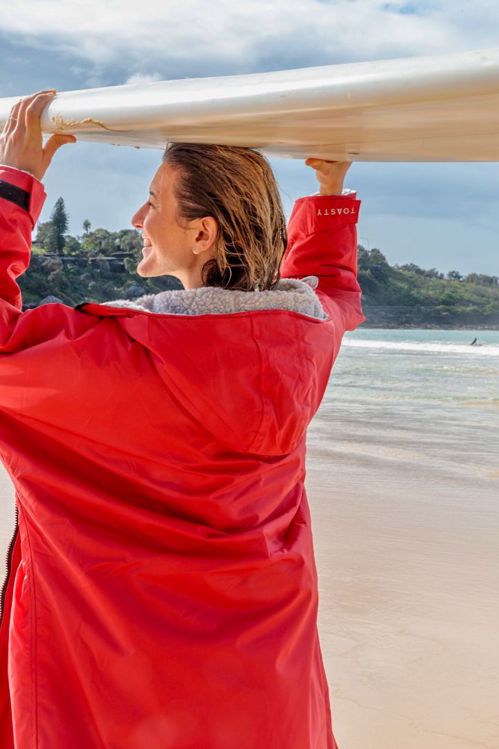 Toasty Red weatherproof, cosy and multifunctional jacket for all outdoor activities. Fully lined with thick, soft, moisture wicking fleece that acts as a blanket to keep your core warm and dry even during the coldest winter months