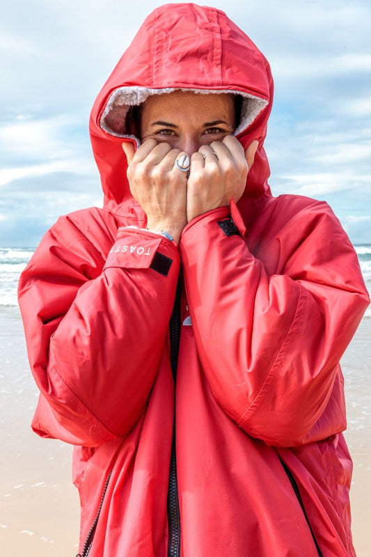 Toasty Red weatherproof, cosy and multifunctional jacket for all outdoor activities. Fully lined with thick, soft, moisture wicking fleece that acts as a blanket to keep your core warm and dry even during the coldest winter months