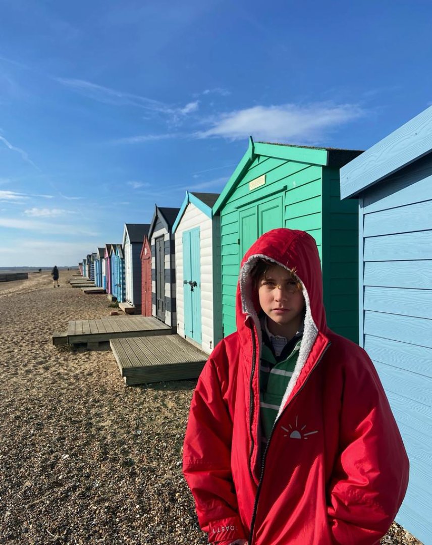 Red kids weatherproof, cosy and multifunctional jacket for all outdoor activities. Fully lined with thick, soft, moisture wicking fleece that acts as a blanket to keep your core warm and dry even during the coldest winter months.