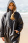TOASTY Fleece lined weatherproof jacket worn by a girl on the beach